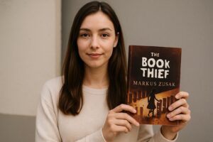 Girl Holding the book thief